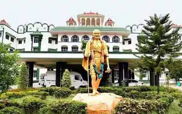 மீனாட்சி அம்மன் கோவில் நிலத்தில் ஆக்கிரமிப்பு: உயர் நீதிமன்றம் நோட்டீஸ்